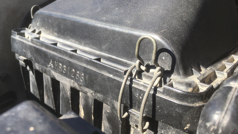 The second-generation Mitsubishi Montero’s air filter can be swapped in about 20 seconds thanks to these convenient clips.